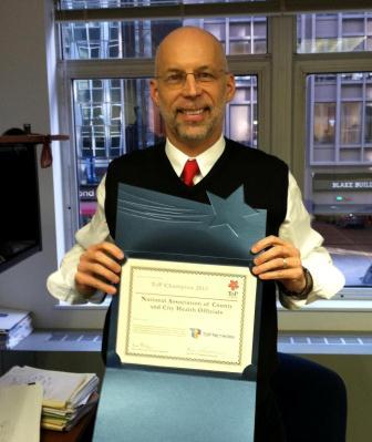 David Dyjack displays ToP Champion recognition